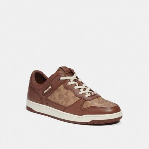 Coach C201 Sneaker In Signature Canvas Bruin | COH866807